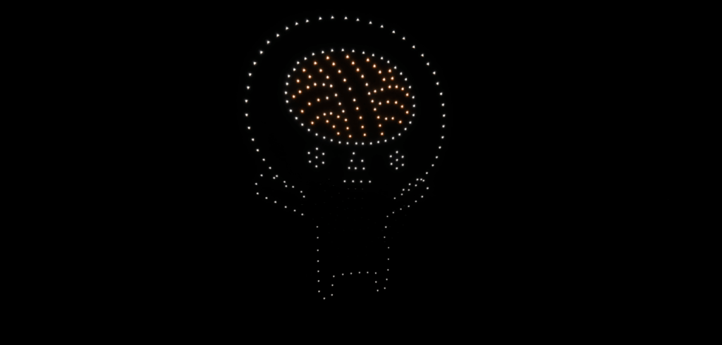 Dotted LED skull outline around an illuminated brain-shaped pattern of lights on a black background.